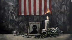 バンクシーが新作公開、黒人男性死亡事件を受けて「燃える星条旗」